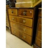 A crossbanded mahogany chest of 5 drawers.