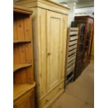 A Victorian pine single door wardrobe.