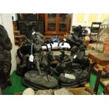 Pair of spelter Marley horse figures and a pair of spelter knights.