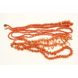 Four coral necklaces comprising two grad