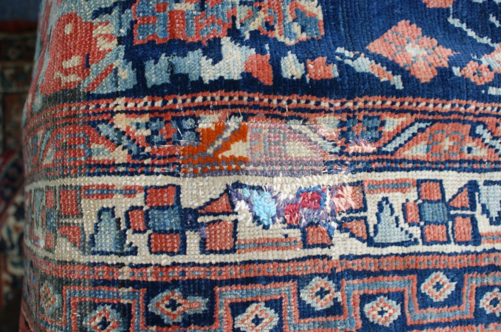 Hamadan woollen carpet, central red medallion against a yellow-fawn ground, - Image 4 of 8