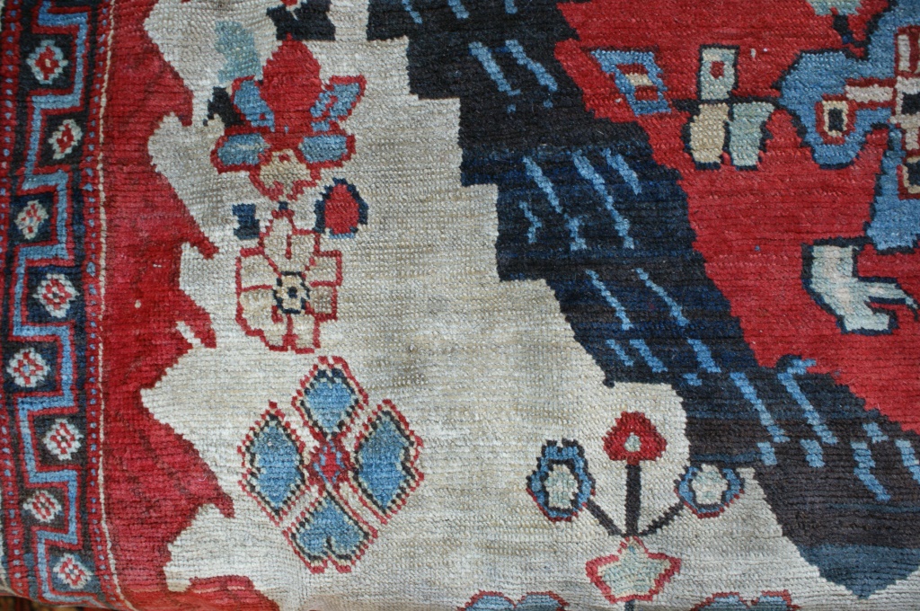 Hamadan woollen carpet, central red medallion against a yellow-fawn ground, - Image 7 of 8