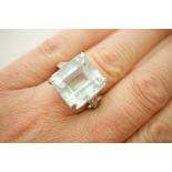 Aquamarine and diamond dress ring, the large square cut aquamarine 16mm x 15mm,