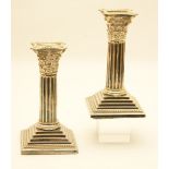 Pair of Edwardian silver plated Corinthian column dwarf candlesticks,