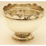 Edwardian silver rose bowl, Chester 1909, scrolled upper rim, plain body over a circular domed foot,