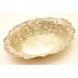 Edwardian silver bowl, Birmingham 1902, oval form repousse decorated with scrolls,