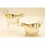 Pair of George V silver sauce boats, Birmingham 1922, each of plain form with gadrooned edge,