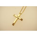 18ct gold and diamond cross form pendant, set with tiny brilliants, marked 'Triantos', 30mm,