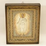 Greek Orthodox icon, 20th Century, worked in pressed white metal featuring a saint,