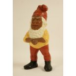 Traditional painted terracotta gnome, cast with hands clasped in front with a white beard,