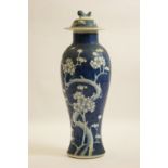 Chinese blue and white prunus pattern vase and cover, late 19th Century,