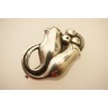 Georg Jensen (Denmark) silver brooch, worked as two flower buds, monogrammed and marked 'Sterling',