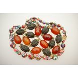 Venetian caned glass bead necklace, 47cm; also an amber coloured bead necklace,