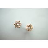 Pair of diamond ear studs by Boodle & Dunthorne, brilliant cut stones estimated as 0.