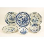 Chinese export blue and white plates comprising a landscape plate with figures on a bridge with a