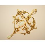 Opal and seed pearl openwork pendant brooch in 9ct gold,