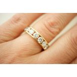 Boodle & Dunthorne diamond eternity ring in 18ct yellow gold,