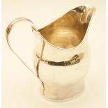 George III helmet shaped milk jug, circa 1800, plain baluster form (marks rubbed), 12cm,