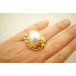 Designer baroque pearl and diamond dress ring in 18ct yellow gold, circa 1990,