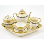 Royal Worcester cabaret tea set, circa 1862, having a lozenge shaped tray, lidded teapot,