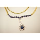 Sapphire and diamond pendant necklace,