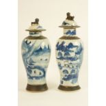 Two Chinese blue and white crackle glazed lidded vases, late 19th/early 20th Century,