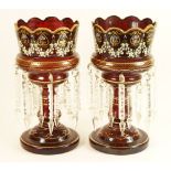 Pair of late Victorian enamelled ruby glass lustres, late 19th Century, with scalloped top,