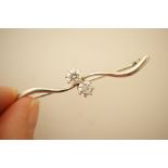 18ct white gold and cubic zirconia bar brooch,