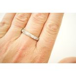 Diamond half eternity ring, set in platinum,