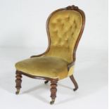 Victorian mahogany spoon back lady's chair, upholstered in green buttoned fabric,