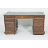 Late Victorian mahogany twin pedestal desk, circa 1900,