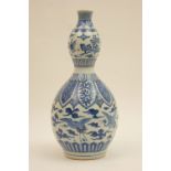 Chinese blue and white gourd vase, 19th Century, decorated with cranes flying amidst clouds,