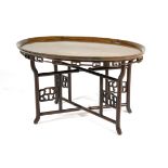 Chinese hardwood oval tray top table, early 20th Century, with a folding base,