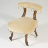 Victorian walnut and upholstered nursing chair,