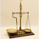Victorian brass and mahogany beam scales by W & T Avery, with brass bell weights to 1lb,