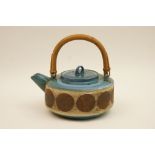 Troika pottery teapot, squat cylinder form with cane handle,