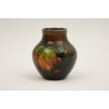 Moorcroft Leaf and Berries small flambe vase, ovoid form, impressed facsimile signature,