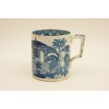 Blue and white printware tankard, decorated with figures within an Oriental garden in a pearl glaze,