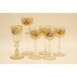 Four Bohemian gilded and hand decorated hock glasses,