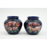 Pair of Moorcroft Anemone small vases, baluster form with wide neck,