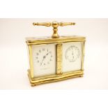 Late Victorian or Edwardian brass clock barometer, with T-bar handle,