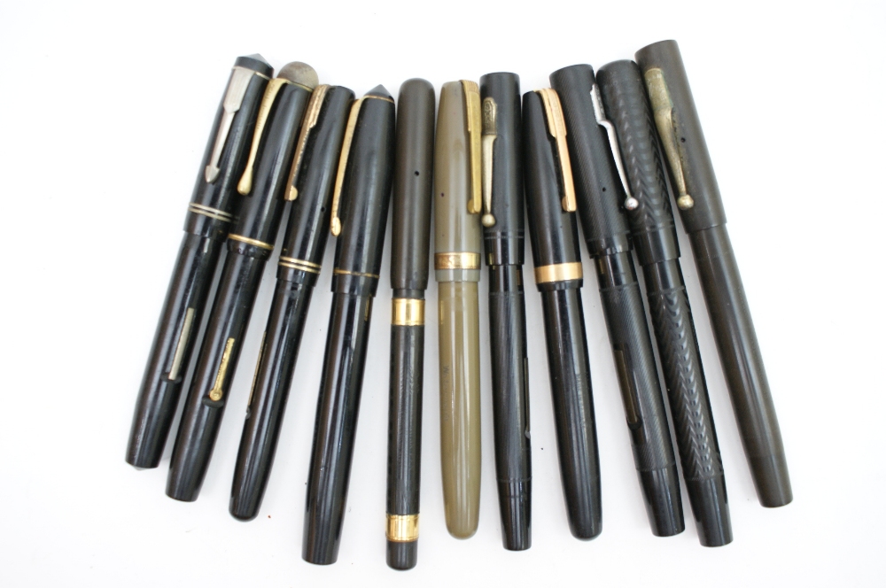 Eleven assorted fountain pens including Waterman and Mabie Todd Swan,