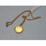 A Victorian gold half-sovereign, 1894, within yellow metal mount, on 9ct. gold chain, 10.2 grams