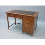 A Maple & Co. Ld. mahogany desk, inset gilt-tooled leather top above one long and four short