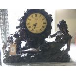 An Art Nouveau-style patinated bronze mantel clock, quartz movement, classical base modelled with