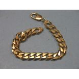 A 9ct. gold curb-link bracelet, 41.7 grams