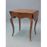 A Louis XV-style mahogany and floral marquetry side table, serpentine-shape with drop-leaves and