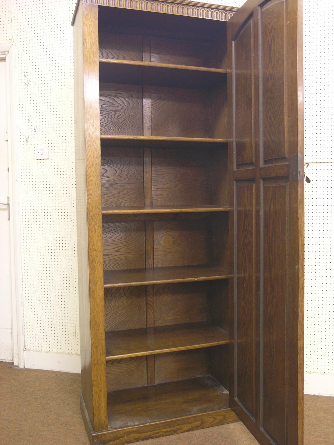 A solid, dark oak hall cupboard, enclosed by single, full-length panelled door, 2ft. 5in. wide - Image 2 of 2