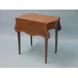 A small Hepplewhite-style mahogany Pembroke table, serpentine-shape with single frieze drawer,