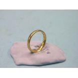 A 22ct. gold band wedding ring, 4.2 grams, size L